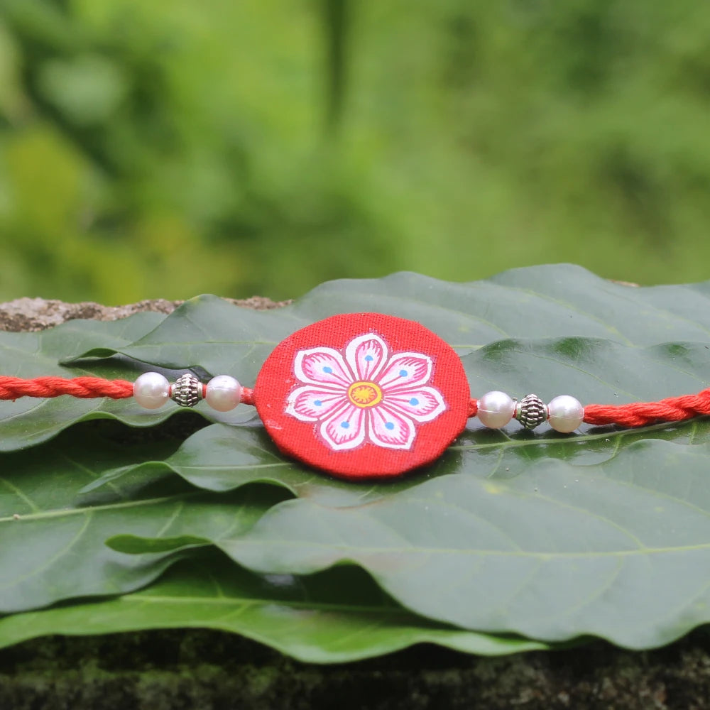 Hand-painted Pattachitra Flower Rakhi Festive Decor | Maavni