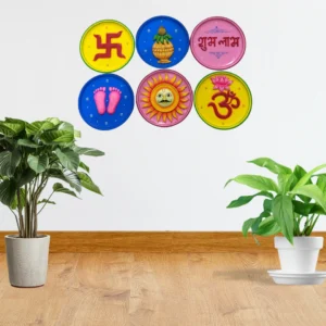 Set of six circular wall plates with auspicious symbols including Om, lotus, kalash, and Shubh Labh text in bright colors arranged on white wall