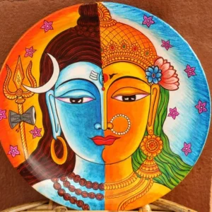 Circular decorative wall plate with split-face motif in orange and blue tones, featuring crescent moon, trident, ornate crown, and elaborate jewelry details, di