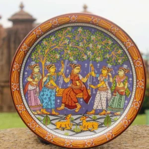 Traditional painted decorative wall plate with five figures in traditional attire beneath a tree, ornate orange floral border, multicolor palette